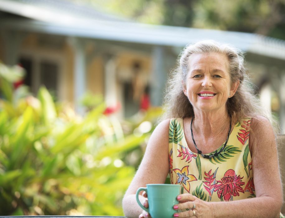 Woman sitting outside with coffee