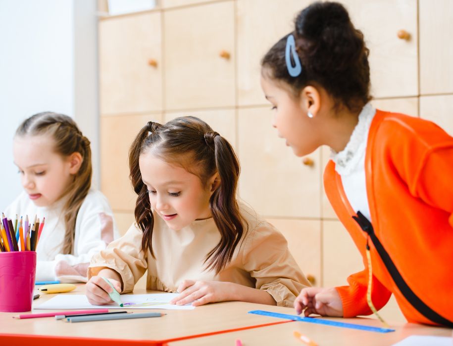 Kids coloring while at school